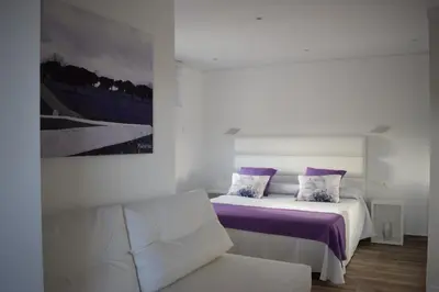 Cama o camas de una habitación en Hotel Restaurante Racha