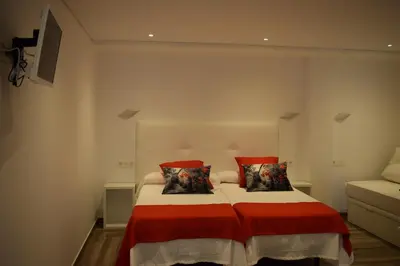 Cama o camas de una habitación en Hotel Restaurante Racha