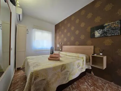 Cama o camas de una habitación en Hostal Alfil