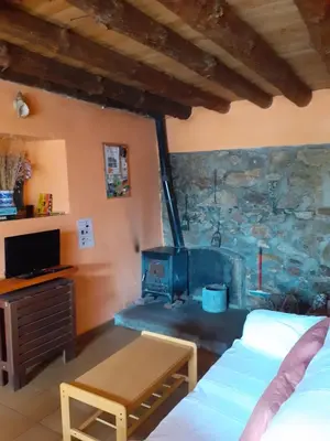 Una televisión o centro de entretenimiento en Al Patio