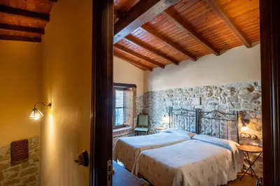 Cama o camas de una habitación en Casa Rural El Molino