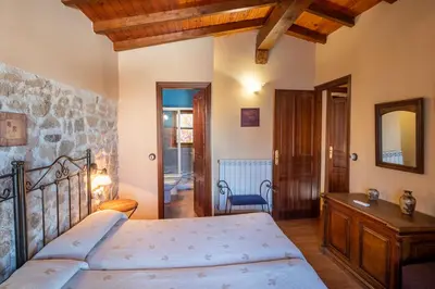 Cama o camas de una habitación en Casa Rural El Molino