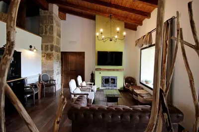 Una televisión o centro de entretenimiento en Hotel Rural San Giles