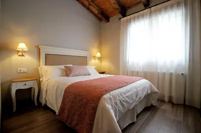 Cama o camas de una habitación en Hotel Rural San Giles