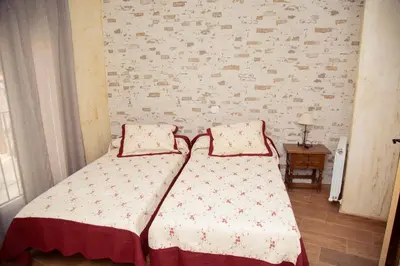 Cama o camas de una habitación en CASA CUATRO ESQUINAS