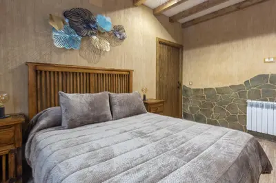 Cama o camas de una habitación en El Rincón de la Iglesia