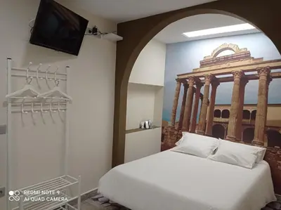 Cama o camas de una habitación en ERES EMÉRITA 