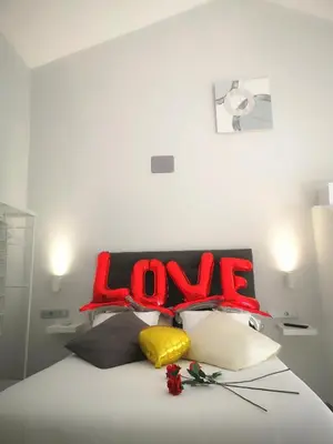 Cama o camas de una habitación en ERES EMÉRITA 