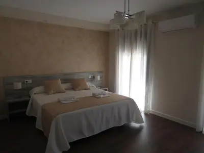 Cama o camas de una habitación en Albergue El Encuentro