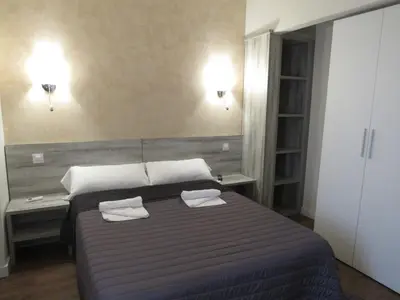 Cama o camas de una habitación en Albergue El Encuentro