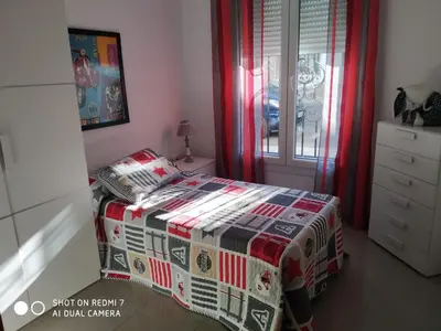 Cama o camas de una habitación en Apartamentos La Bodega