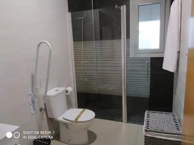 Un baño de Apartamentos La Bodega
