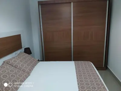 Cama o camas de una habitación en Apartamentos La Bodega