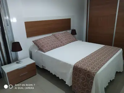 Cama o camas de una habitación en Apartamentos La Bodega
