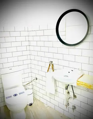 Un baño de Apartamentos Villas Romanas