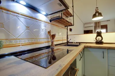 Una cocina o zona de cocina en Casa Rural A Cashiña da Lagarteira