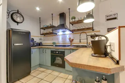 Una cocina o zona de cocina en Casa Rural A Cashiña da Lagarteira