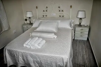 Cama o camas de una habitación en Apts la cañada birding con encanto y patio en monfrague torrejon el Rubio