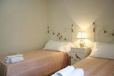 Cama o camas de una habitación en Apts la cañada birding con encanto y patio en monfrague torrejon el Rubio