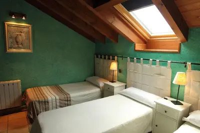 Cama o camas de una habitación en El Mirador del Alberche III