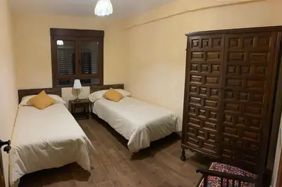 Cama o camas de una habitación en Casa Rural El Molino