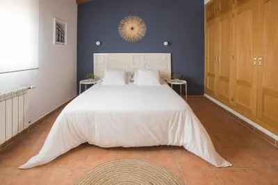 Cama o camas de una habitación en Casa turística Me quedo en el pueblo