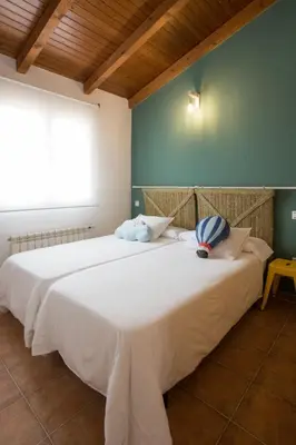 Cama o camas de una habitación en Casa turística Me quedo en el pueblo