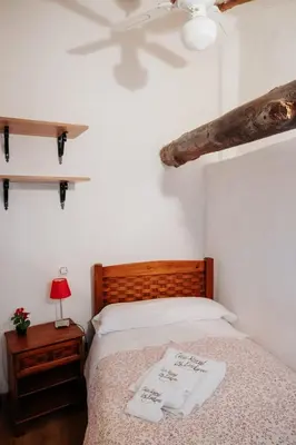 Cama o camas de una habitación en Casa Rural los Enebros