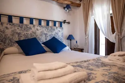 Cama o camas de una habitación en Casa Rural los Enebros