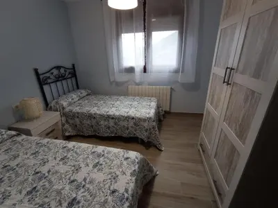 Cama o camas de una habitación en Alojamientos Rurales Hurdes Altas - La Antigua Guarderia