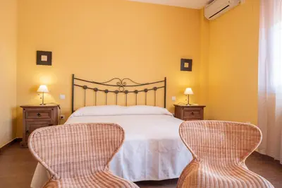 Cama o camas de una habitación en Casa en el pantano de Orellana