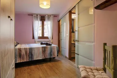 Cama o camas de una habitación en La Casa de Nini