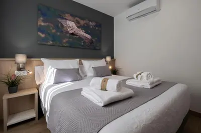 Cama o camas de una habitación en Luxor Torre del Clavero Apartments