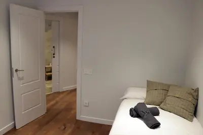 Cama o camas de una habitación en Ático Industrial Céntrico, Reformado, Air-Acond, WiFi