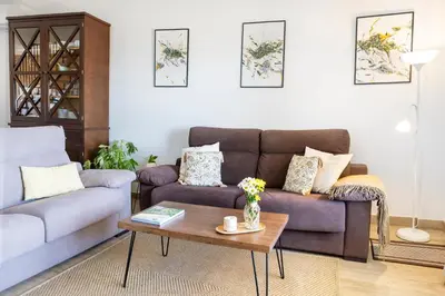 Zona de estar de Apartamentos rurales Posada de Monfragüe con jacuzzi