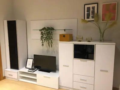Una televisión o centro de entretenimiento en ARTHEUS APARTAMENTOS