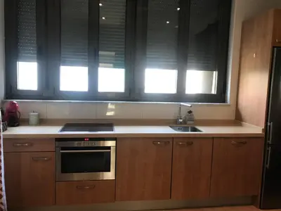 Una cocina o zona de cocina en ARTHEUS APARTAMENTOS