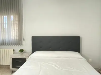 Cama o camas de una habitación en Apartamento Serranos Centro Histórico
