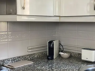 Una cocina o zona de cocina en Apartamento Serranos Centro Histórico