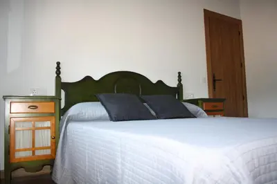 Cama o camas de una habitación en Casa Rural Avellaneda