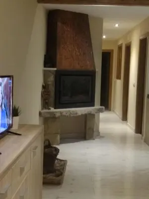 Una televisión o centro de entretenimiento en Apartamento La Agripina