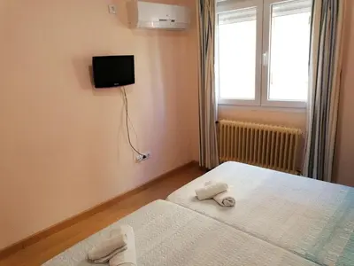 Cama o camas de una habitación en Hostal Hernan Cortes