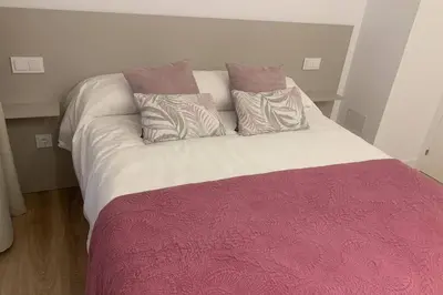 Cama o camas de una habitación en VUT La Casa de las Flores