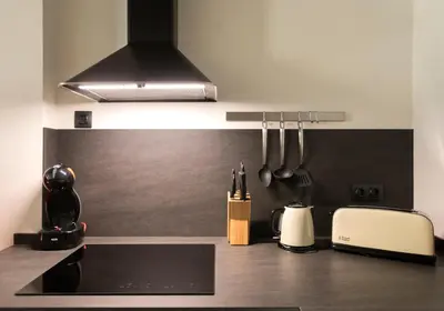 Una cocina o zona de cocina en ERASMUS PLAZA
