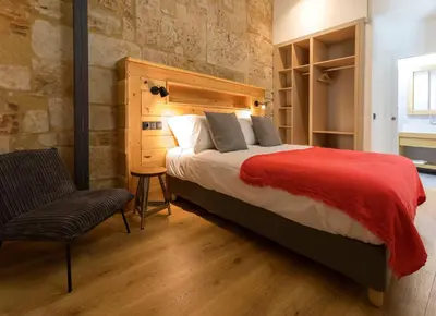 Cama o camas de una habitación en ERASMUS PLAZA