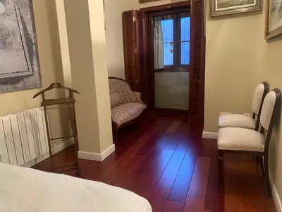 Cama o camas de una habitación en JAGUAR garaje y wifi