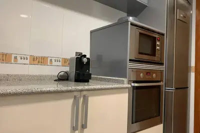 Una cocina o zona de cocina en MORGAN wifi y garaje