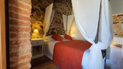 Cama o camas de una habitación en Casas del Castillo, 2