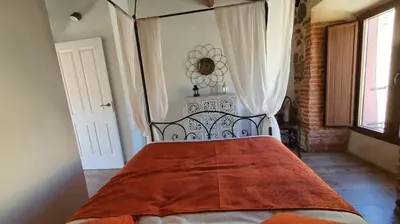 Cama o camas de una habitación en Casas del Castillo, 2