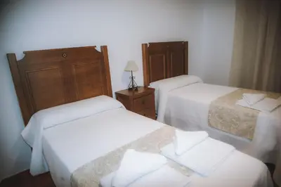 Cama o camas de una habitación en Casa Rural Los Belloso
